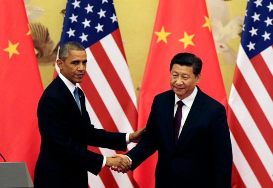 U.S. President Barack Obama, left, shakes hand with Chinese President Xi Jinping after their press conference at the Great Hall of the People in Beijing, China Wednesday, Nov. 12, 2014. (AP Photo/Andy Wong) XAW126